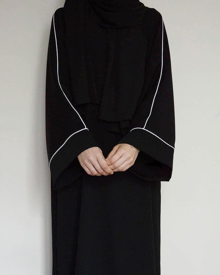 Minimalist white-piped abaya